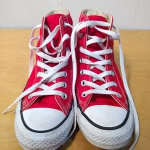 Red Converse high top sneakers